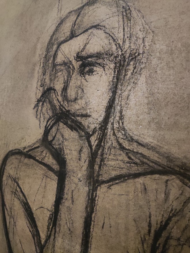 Portrait au fusain sur papier gris, œuvre d'atelier